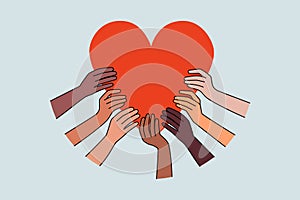 Diverse hands hold huge heart share love