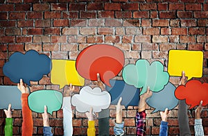 Diverse Hands Holding Colourful Speech Bubbles