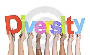 Diverse Hands Holding The Word Diversity photo