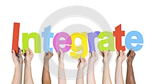 Diverse Hands Holding the Word Integrate photo