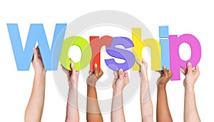 Diverse Hands Holding The Word Worship photo