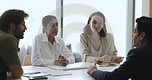 Diverse HR team and job candidate talking at interview