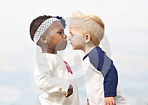 Diverse Little Kids First Kiss