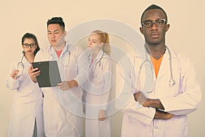 Diverse multi ethnic group of doctors working together
