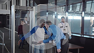 Diverse passengers passing security control