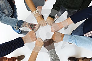 Diverse People Hands Fists Together Partnership