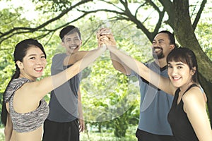 Diverse people with high five hands gesture