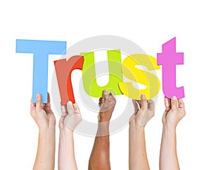 Diverse People Holding Single Word Trust photo