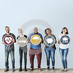 Diverse people with insurance protection icons plan