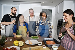 Diverse people joining cooking class