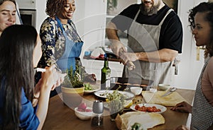 Diverse people joining cooking class