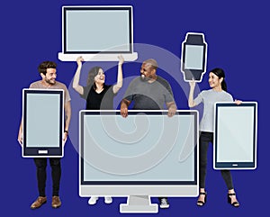 Diverse people with various mockup of digital devices