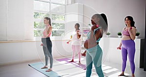 Diverse Pregnant Group Gym Fitness Exercise
