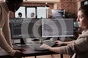Diverse programming engineers developing html code
