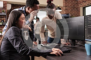 Diverse programming engineers talking about html script