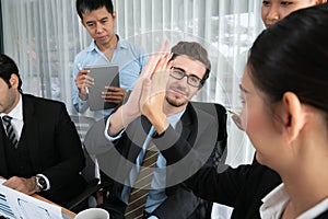 Diverse race office worker celebrate after made progress. Habiliment