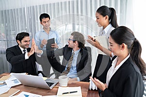 Diverse race office worker celebrate after made progress. Habiliment