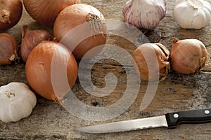 Diverse selection of spanish onions and garlic