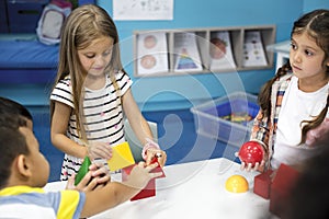 Diverse students at daycare playing