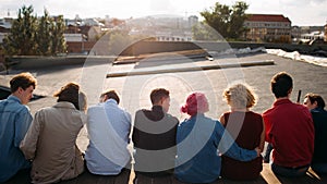 Diverse students rooftop unity communication