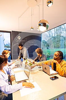 Diverse Team Engaged in a Collaborative Workspace
