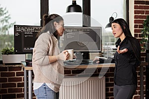 Diverse tech enginners developing software algorithm