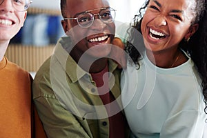 Diverse teen friends laughing together