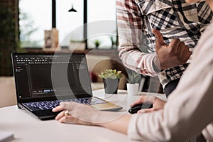 Diverse web developers programming html script
