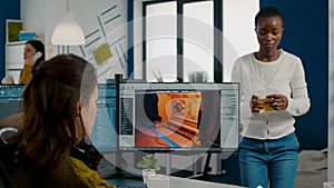 Diverse women game sofware developers testing new game