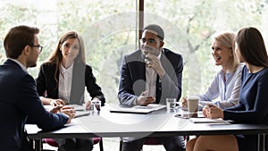 Diverse workmates participating in briefing listen project leader photo