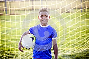 Diverse young boy on a youth soccer team photo