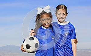 Diverse young girl soccer players