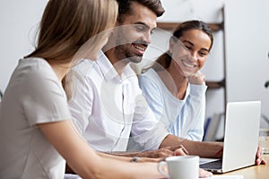 Diverse young multiracial colleagues working together in office