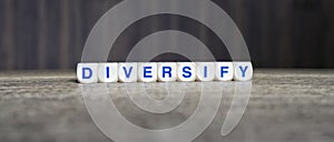 Diversify boggle word cubes dark background