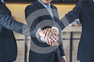 Diversity business partner people teamwork holding hands together power of tag team. Multiethnic Teamwork friendship group