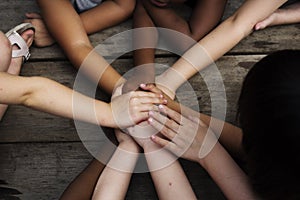 Diversity Group Of Kids Put Hands Together photo