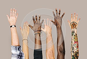 Diversity hands raised up gesture photo