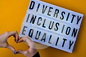 Diversity inclusion equality lettering. Text. Diversity, Age, Ethnicity, Sexual Orientation, Gender, Religion. Equal rights social