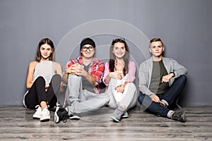 Diversity People sitting on the floor Connection Digital Devices Browsing Concept i