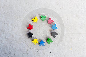 Diversity, social union, together, Small human shaped colored wooden pieces