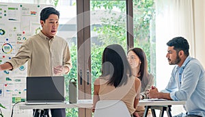 diversity team presentation in ESG sustainability business goals sdgs in green office photo