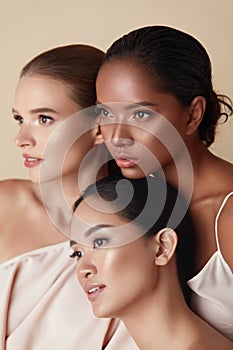 Diversity. Women Beauty Portrait. Multi-Ethnic Models Standing Together And Looking Away. Asian, Mixed Race And Caucasian Female