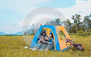 Diversity Young Asian women camping and resting