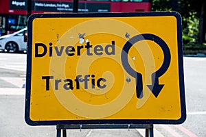 Diverted traffic sign board photo