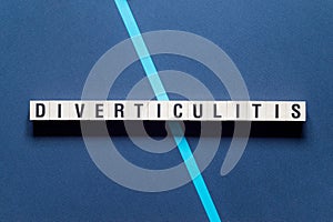 Diverticulitis word concept on cubes