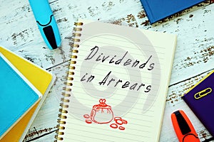 Dividends in Arrears sign on the page