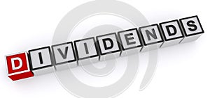 Dividends word block photo