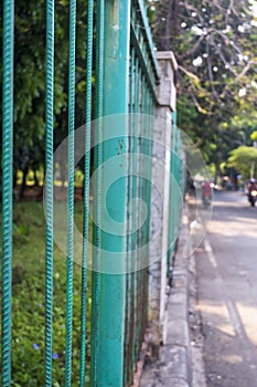 dividing fence between the park and the street