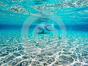 Diving in clear blue water