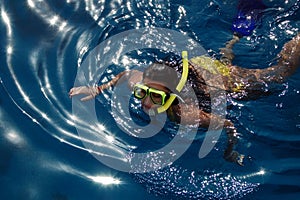 Diving girl in the sea